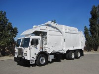 2012 Peterbilt 320 with McNeilus Pacific 40yd CNG Front Loader Refuse Truck