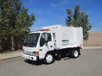 2004 GMC W5500 with New Way 6yd Satellite Side Loader Refuse Truck