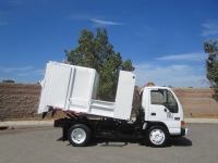 2004 GMC W5500 with New Way 6yd Satellite Side Loader Refuse Truck