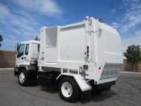 2007 GMC T7500 with Heil Retriever Satellite 10 Yard Side Load Refuse Truck