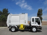 2007 GMC T7500 with Heil Retriever Satellite 10 Yard Side Load Refuse Truck