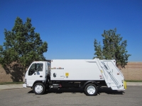 2006 Isuzu NQR with New Way Diamondback 8 Yard Rear Load Refuse Truck