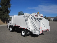 2000 GMC W4500 with Wayne Super Series 6 Yard Rear Load Refuse Truck