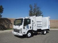 2008 Isuzu NPR with Wayne Tomcat 6 Yard Side Load Refuse Truck