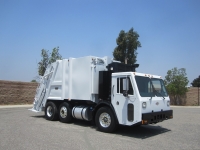 2010 Crane Carrier LET with Pak-Mor 18 Yard Rear Loader Refuse Truck