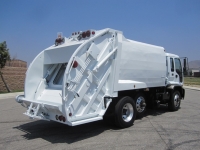 1999 GMC T8500 with McNeilus 17 Yard Rear Load Refuse Truck