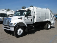 2004 International 7300 with McNeilus 17yd Rear Loader Refuse Truck