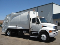 2003 Sterling Acterra with McNeilus 20yd Rear Loader Refuse Truck