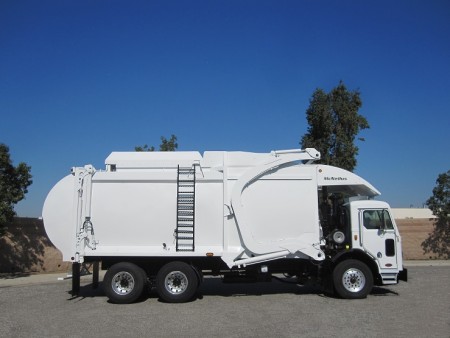 2012 Peterbilt 320 with McNeilus Pacific 40yd CNG Front Loader Refuse Truck