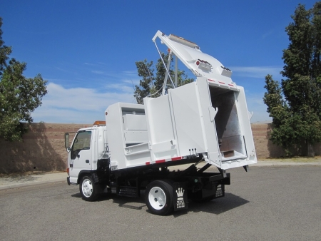 2004 GMC W5500 with New Way 6yd Satellite Side Loader Refuse Truck