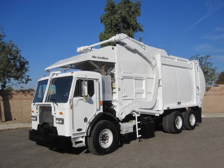 2013 Peterbilt 320 with McNeilus Atlantic 40yd Front Loader Refuse Truck