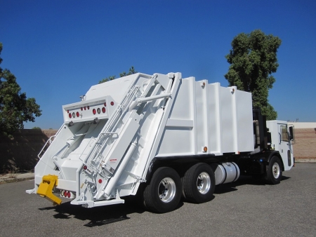 2010 Crane Carrier LET with Pak-Mor 25 Yard Rear Loader Refuse Truck