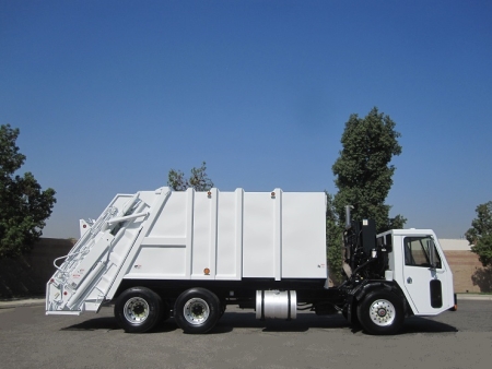 2010 Crane Carrier LET with Pak-Mor 25 Yard Rear Loader Refuse Truck