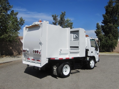 2004 GMC W5500 with New Way 6yd Satellite Side Loader Refuse Truck