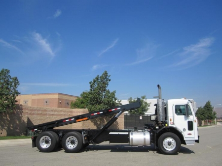 2002 Peterbilt 320 Roll Off Truck with Amrep Roll Off Hoist