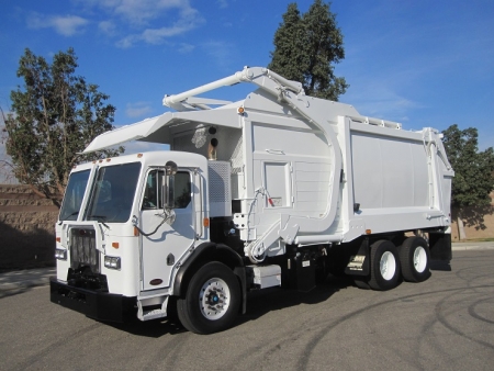 2012 Peterbilt 320 with Heil Half/Pack 40 Yard Front Loader Refuse Truck