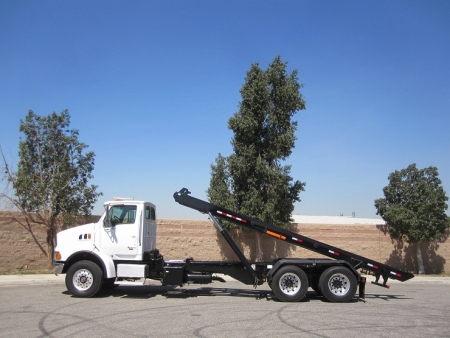 2007 Sterling LT9500 with Edge Mfg Roll Off Truck