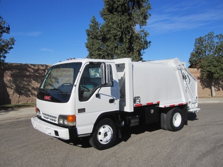 2000 GMC W4500 with Wayne Super Series 6 Yard Rear Load Refuse Truck