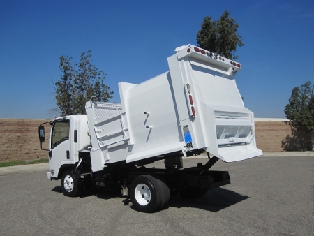 2008 Isuzu NPR with Wayne Tomcat 6 Yard Side Load Refuse Truck