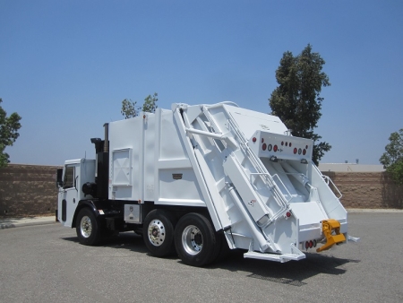 2010 Crane Carrier LET with Pak-Mor 18 Yard Rear Loader Refuse Truck