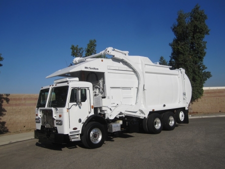 2011 Peterbilt 320 with McNeilus Atlantic 40yd Front Loader Refuse Truck