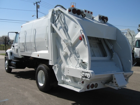 2004 International 7300 with McNeilus 17yd Rear Loader Refuse Truck