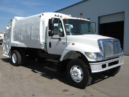 2004 International 7300 with McNeilus 17yd Rear Loader Refuse Truck