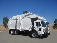 2012 Peterbilt 320 with McNeilus Pacific 40yd CNG Front Loader Refuse Truck