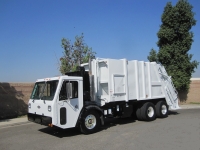 2010 Crane Carrier LET with Pak-Mor 25 Yard Rear Loader Refuse Truck