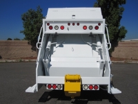 2010 Crane Carrier LET with Pak-Mor 25 Yard Rear Loader Refuse Truck