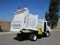 2008 Isuzu NPR with Wayne Tomcat 6 Yard Side Load Refuse Truck