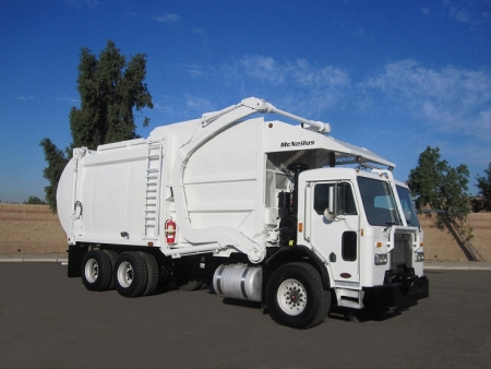 2013 Peterbilt 320 with McNeilus Atlantic 40yd Front Loader Refuse Truck