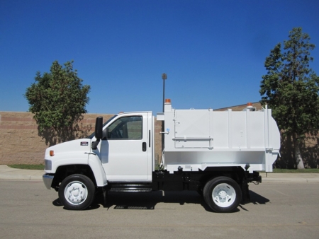 2005 GMC TopKick C4500 with Wayne Pup 6 Yard Side Loader Refuse Truck