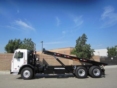 2002 Peterbilt 320 Roll Off Truck with Amrep Roll Off Hoist