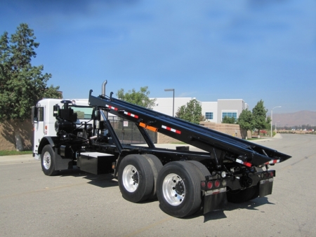 2002 Peterbilt 320 Roll Off Truck with Amrep Roll Off Hoist