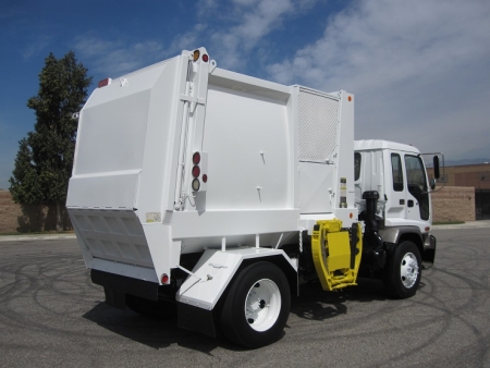 2007 GMC T7500 with Heil Retriever Satellite 10 Yard Side Load Refuse Truck