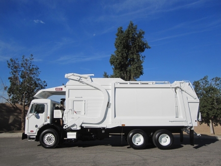 2011 Peterbilt 320 with Heil Half/Pack 40 Yard Front Loader Refuse Truck