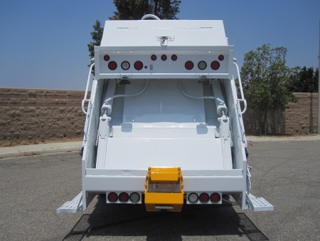 2010 Crane Carrier LET with Pak-Mor 18 Yard Rear Loader Refuse Truck