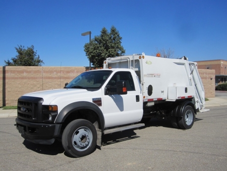 2009 Ford F-450 with New Way Diamondback 6 Yard Rear Load Refuse Truck