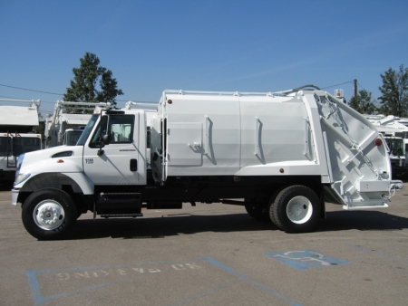 2004 International 7300 with McNeilus 17yd Rear Loader Refuse Truck